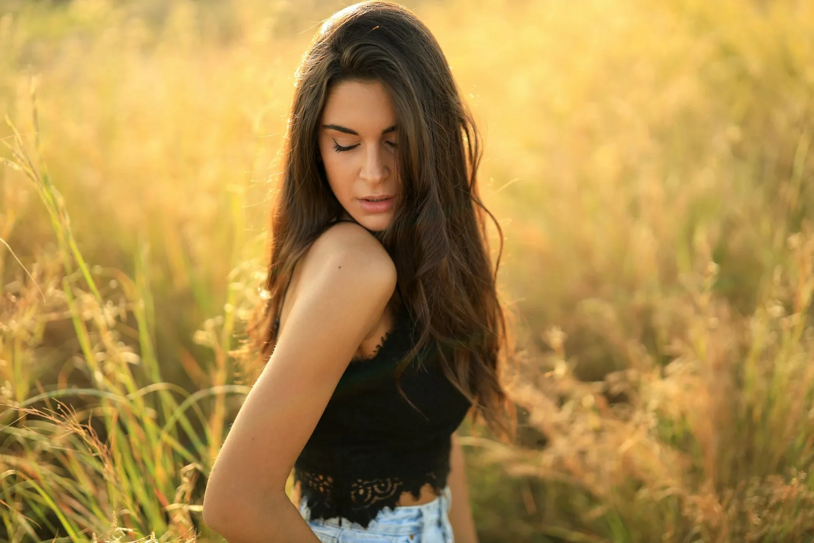 Warm bronde with a soft gloss, glowing in golden light.